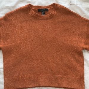 orange-brown long sleeve shirt
